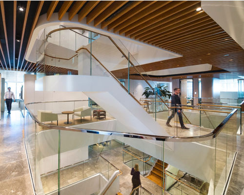 15mm Clear Toughened Curved Glass Frameless cantilever panels grouted into floor channel